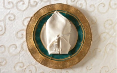 Easy step-by-step instructions to fold your napkins into Two Tails for a special family dinner. It's only eight simple steps to a more festive, elegant holiday table!