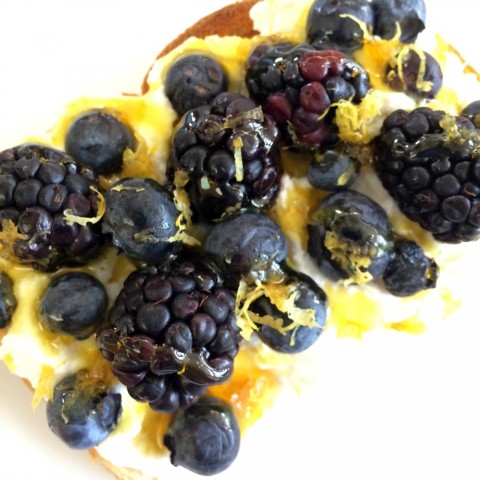 Crunchy, creamy, fruity, tart and sweet, this Breakfast Toast with Ricotta, Berries, Lemon and Honey is just what you need to make it worthwhile to wake up. Plus, it's pretty! ShockinglyDelicious.com