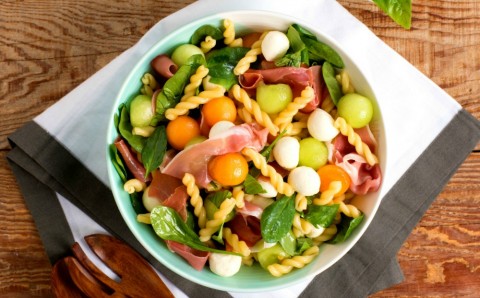 Melon and Prosciutto Pasta Salad: Prosciutto-wrapped melon is a classic Italian appetizer. When these simple flavors are tossed with pasta and spinach, they make a delicious, low-calorie quick and portable lunch or side dish. 