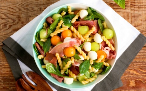 Melon and Prosciutto Pasta Salad: Prosciutto-wrapped melon is a classic Italian appetizer. When these simple flavors are tossed with pasta and spinach, they make a delicious, low-calorie quick and portable lunch or side dish.