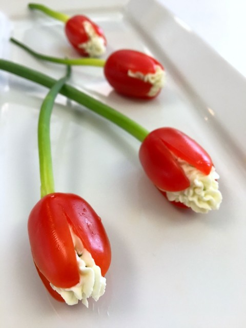 Loose Grape Tomato Cream Cheese Tulips on a long white plate