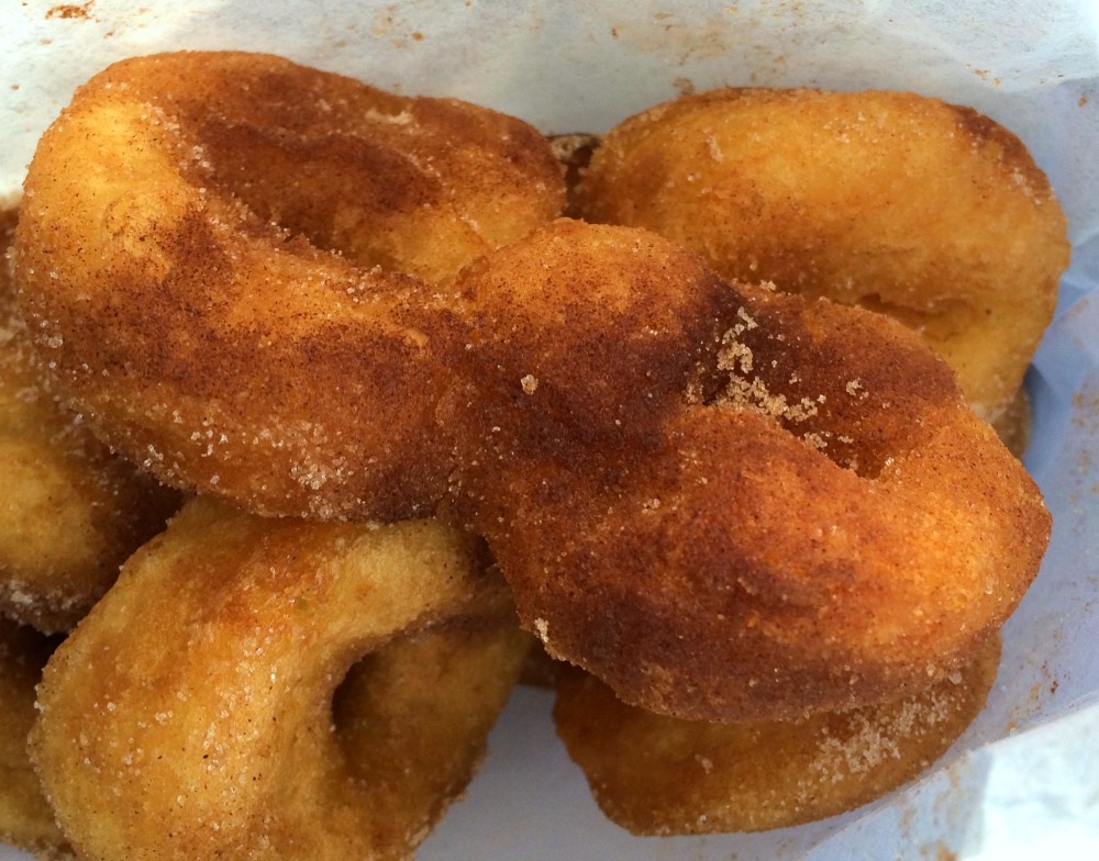 Apple Cider Donuts in a white bag at Snowline Orchard and Winery in Oak Glen Calif