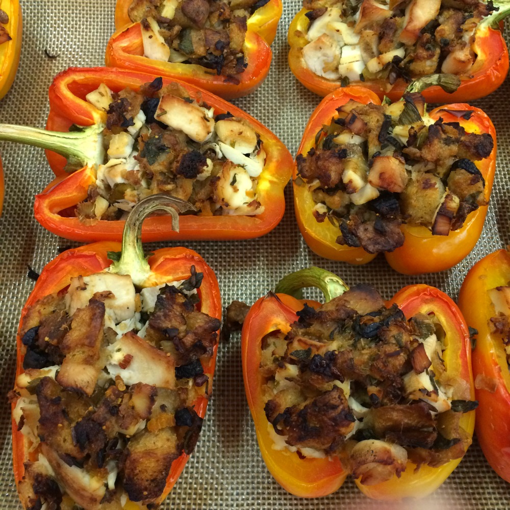 Turkey and Stuffing Stuffed Peppers Baked and out of the oven, on the baking sheet