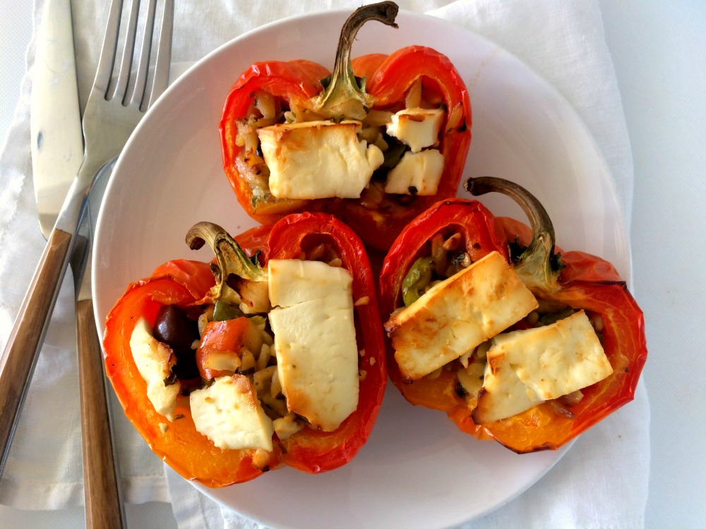 3-Ingredient Greek Stuffed Peppers are stuffed with deli Greek Orzo Salad, topped with feta cheese and baked for an easy, delicious dinner.