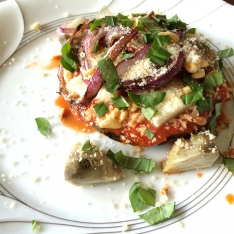 Portobello Pizza with Artichokes on a white plate on ShockinglyDelicious.com