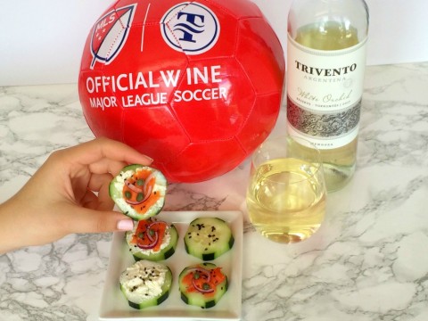 Cucumber Smoked Salmon Appetizer Bites with Trivento wine and a red soccer ball