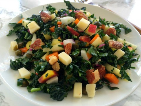 KALE SALAD WITH APPLES, CARROTS, CHEESE and CAPERS: Hearty enough to stand up to anything you serve with it, this easy-to-eat chopped salad has sweet, sharp, salty and crunchy notes, for a perfectly balanced forkful.