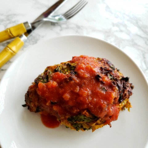Mexican Turkey Meat Loaf with salsa on top on a white plate on ShockinglyDelicious.com