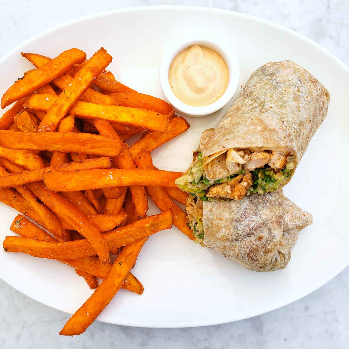 Salmon Salad Wrap on a white plate at The Sparrow Cafe in Malibu