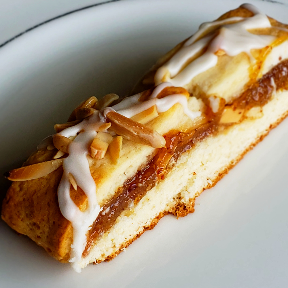 Slice of Cream Cheese Pastry with Almond Filling