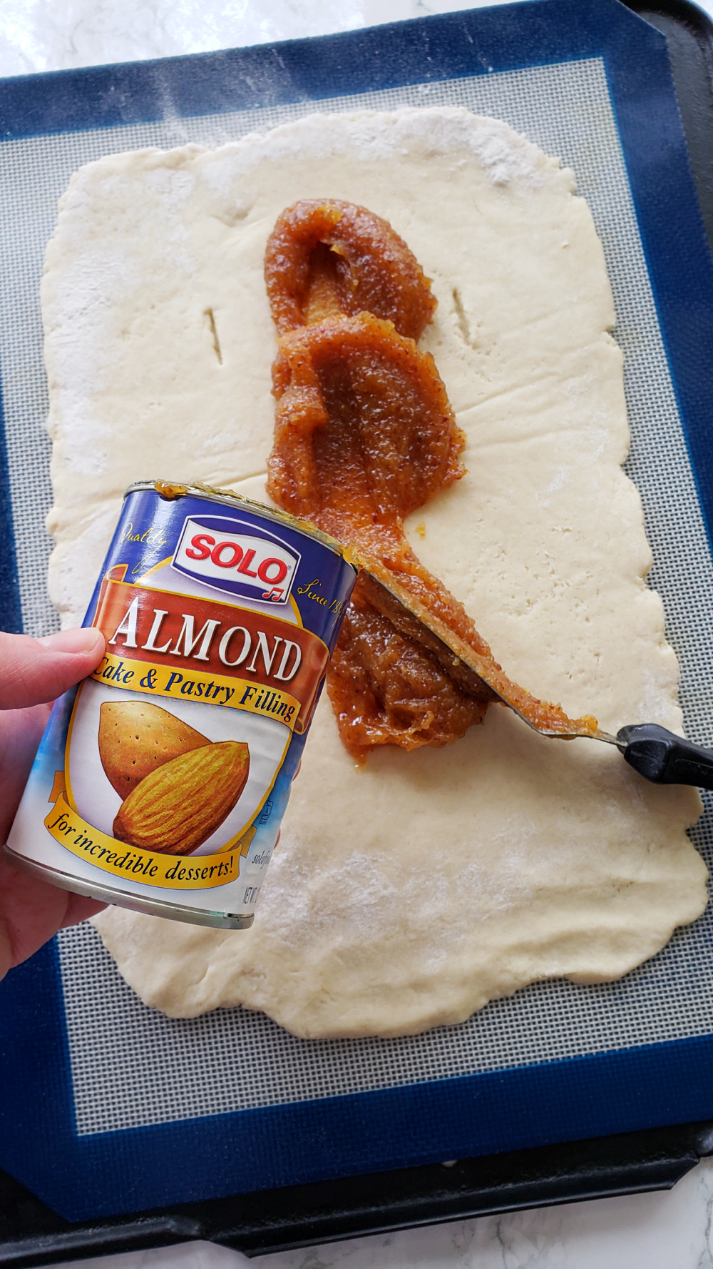 Spread the Solo Almond Filling on Cream Cheese Pastry