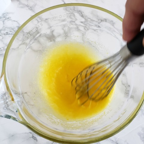 Whisk eggs and sugar with OXO whisk