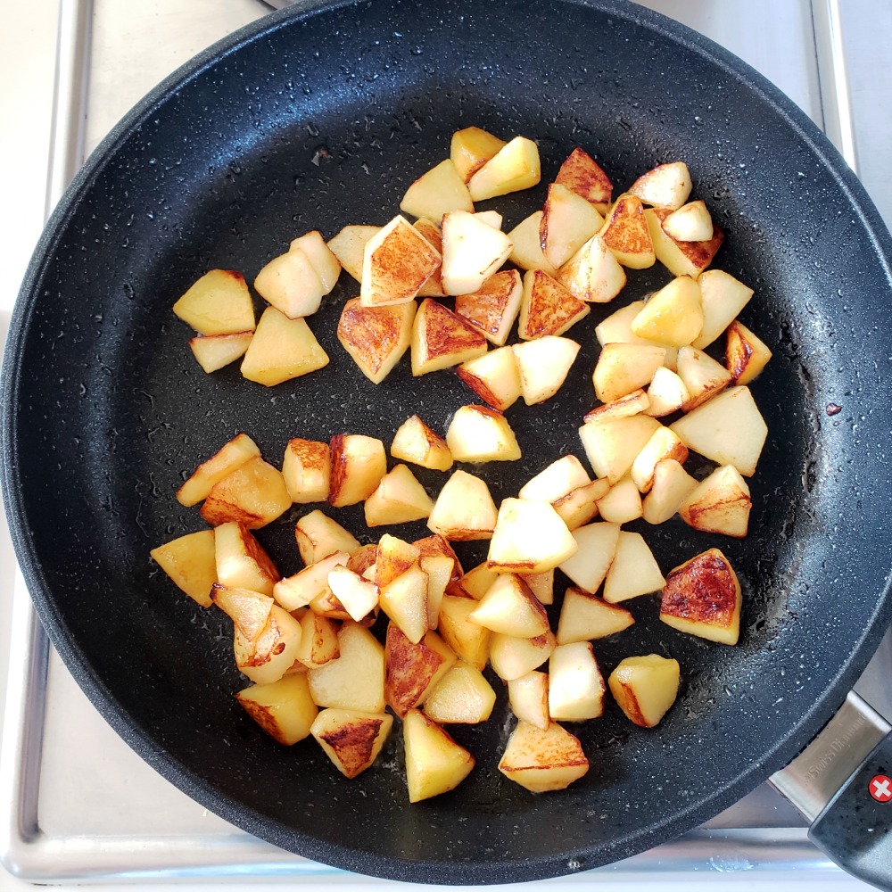 Browned apples in black skillet