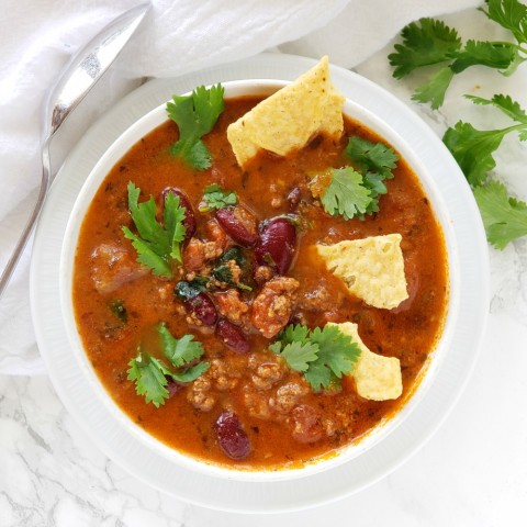 Instant Pot Bison Tortilla Soup in a white bowl