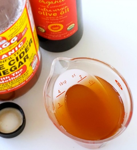 Apple cider vinegar in OXO's angled measuring cup