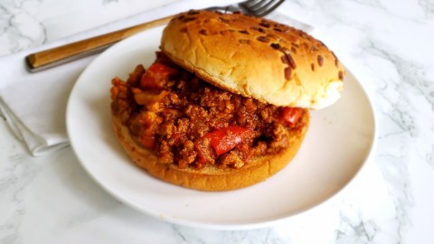 Slightly sweet & tangy, very meaty comforting Sloppy Joe on a soft, toasted onion bun. This easy recipe saves time by using an Instant Pot, on ShockinglyDelicious.com