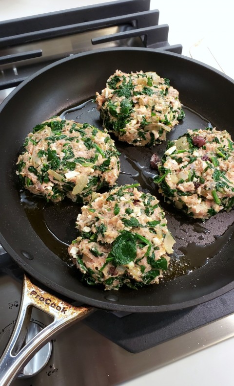 Turkey Spanakopita Burgers in the skillet on ShockinglyDelicious.com