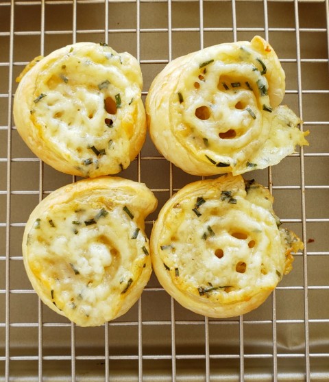 Cheesy Fondue Spirals bring all the wonderful flavor of a classic fondue to a crispy 3-bite appetizer. These will be your new go-to nibble for parties, potlucks and brunches.