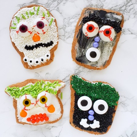 Shatteringly crisp Spooky Lemon-Vanilla Shortbread Cookies are decorated for Halloween time with colored icing, sprinkles and candy decorations. Scarier for older kids, more friendly-spooky for younger kids, and everyone gets a little shiver.