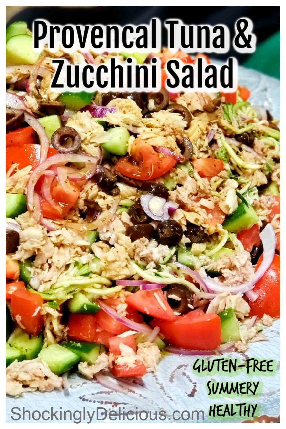 Tuna and Zucchini Salad on a white plate with the recipe title superimposed on top