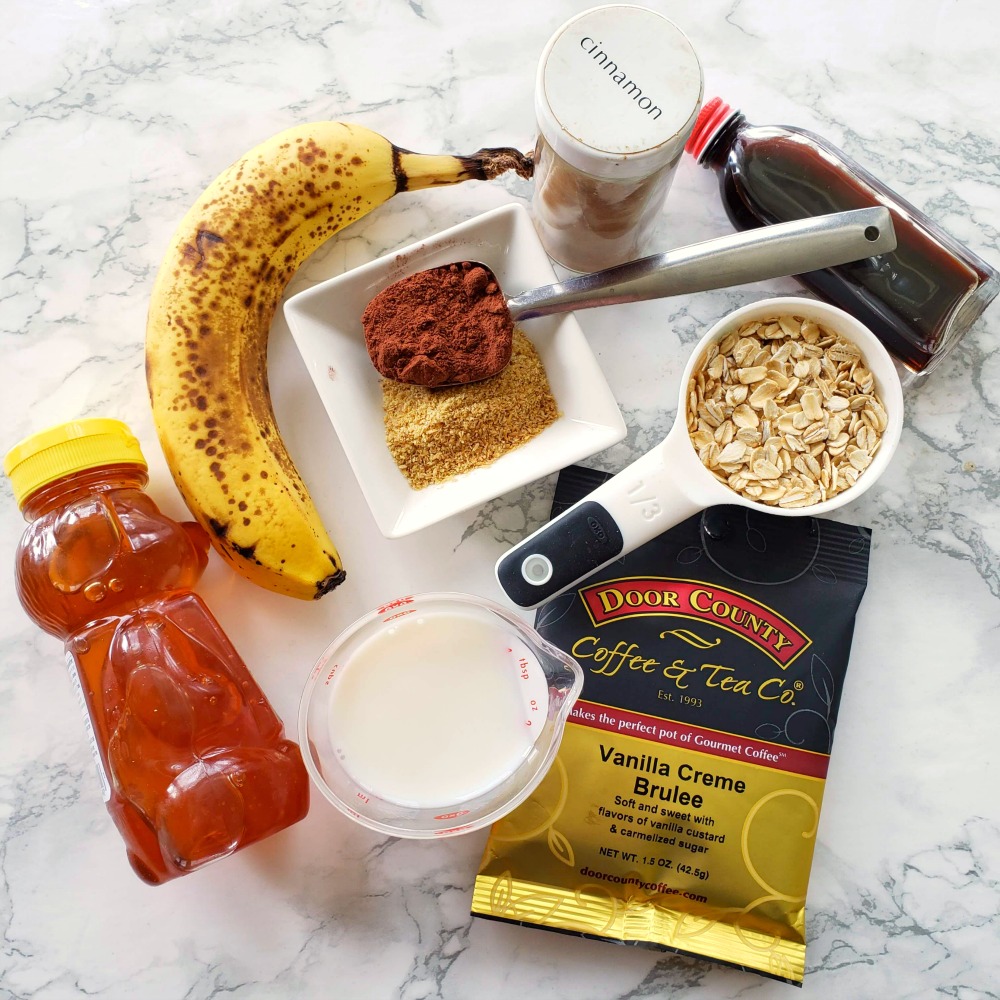 Collection of ingredients for coffee smoothie layed out on the counter