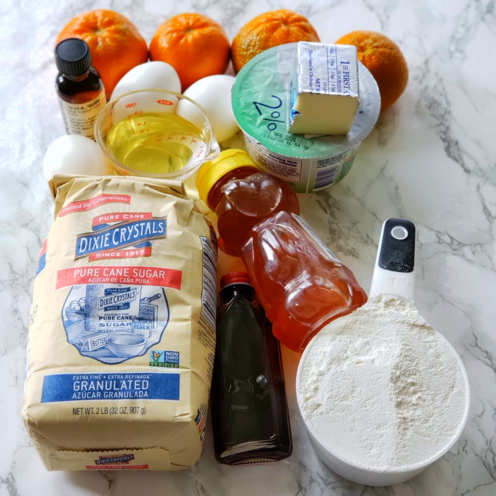 Array of ingredients on a white marble counter