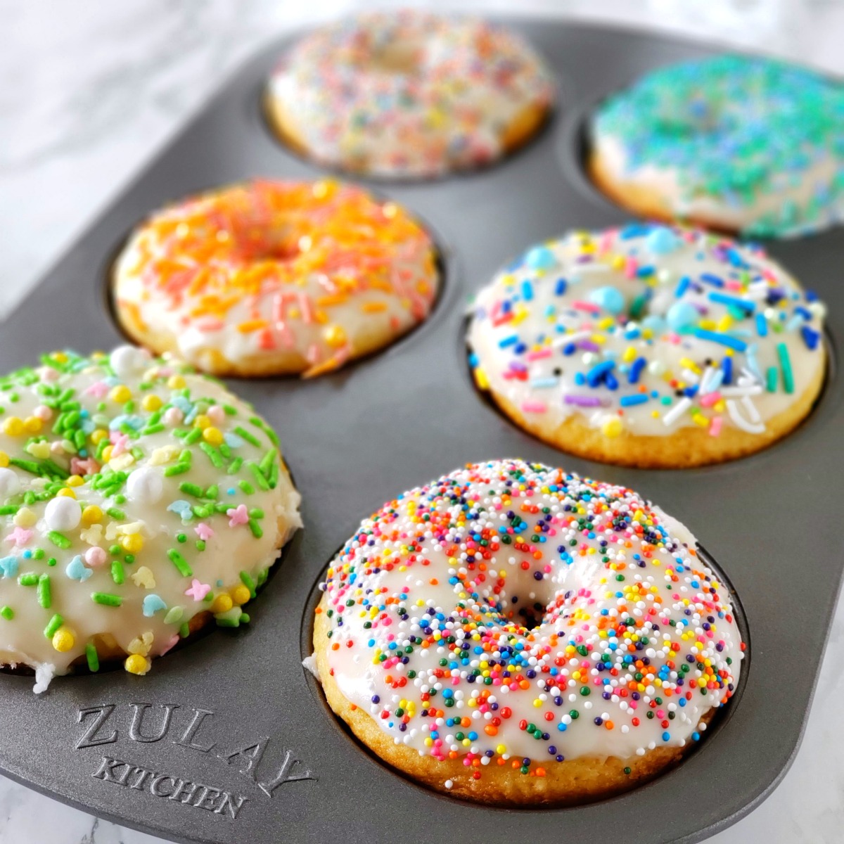 Easy Glazed Baked Donuts in a baking pan