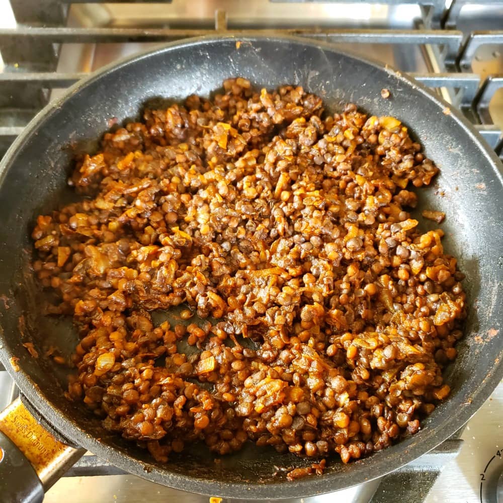 Barbecue Baked Lentils in a skillet on the stove