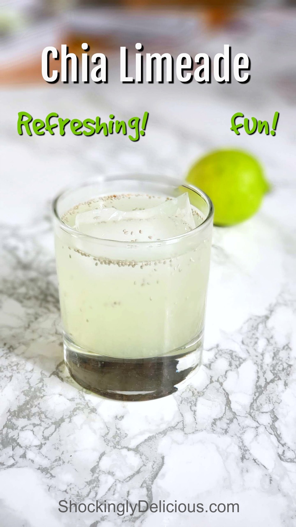 Easy Chia Limeade in a glass on a marble counter