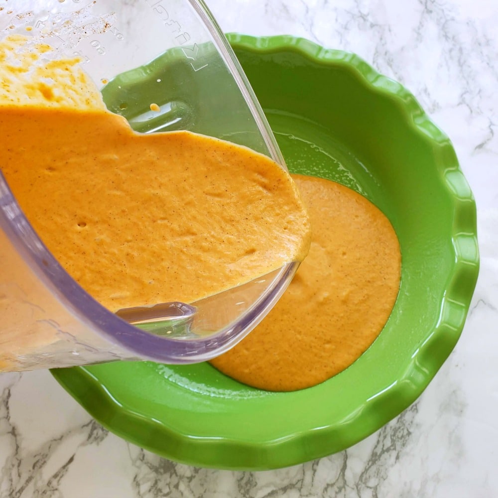 Pour pie filling from blender container into the pie dish