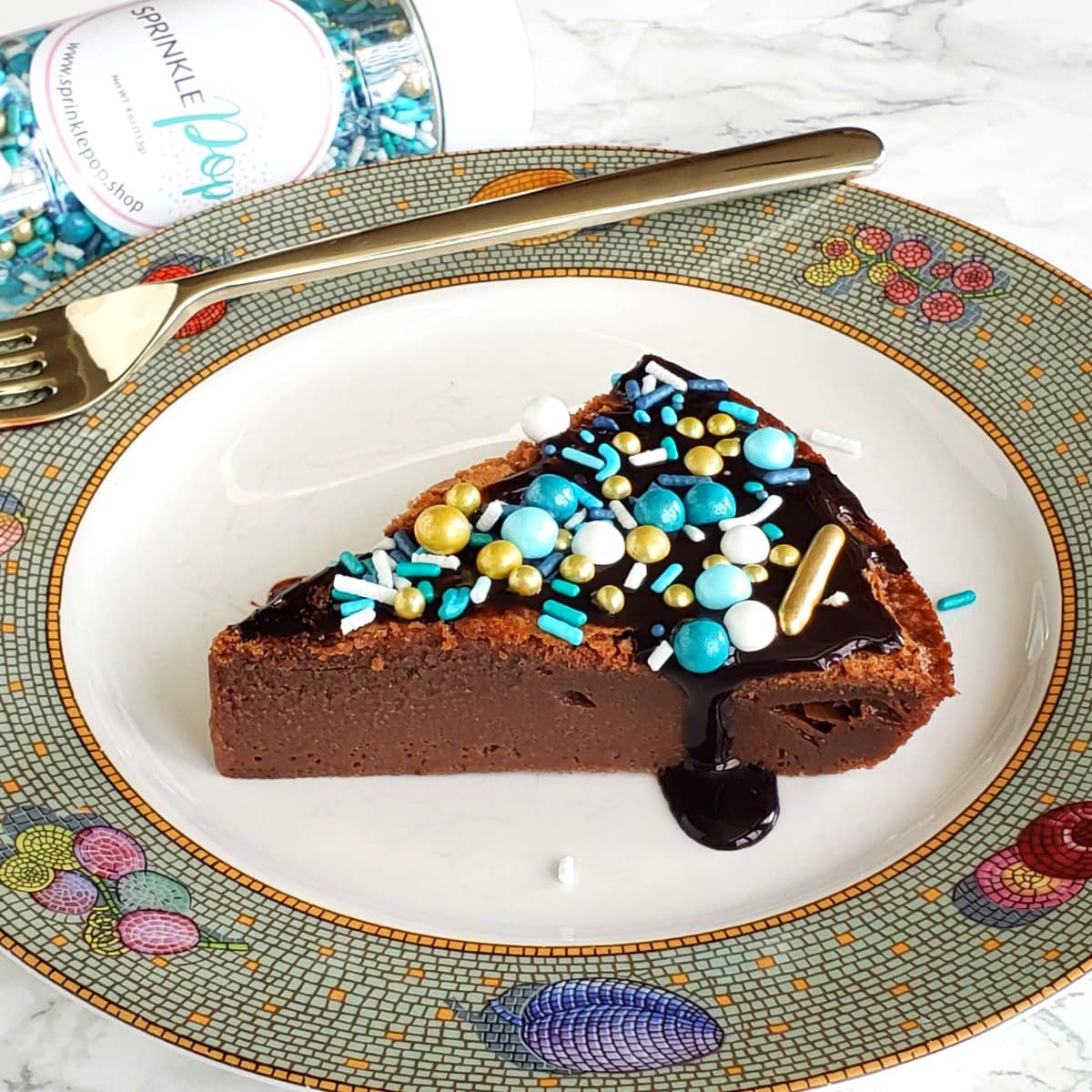 Chocolate Impossible Pie with sprinkles on top on ShockinglyDelicious.com