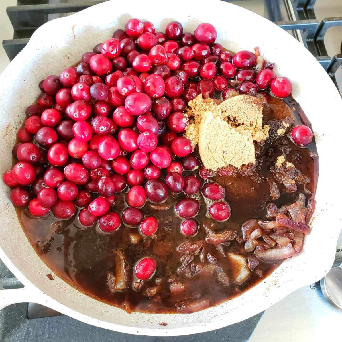 Add cranberries and sugar to the skillet