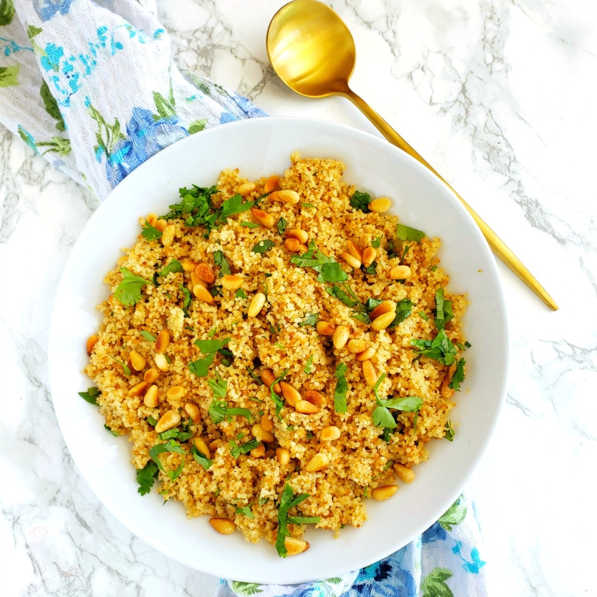 Couscous with Cumin and Pine Nuts is deceptively simple and decidedly flavorful with a large payoff for a small effort. It serves 1, but can easily be scaled up.