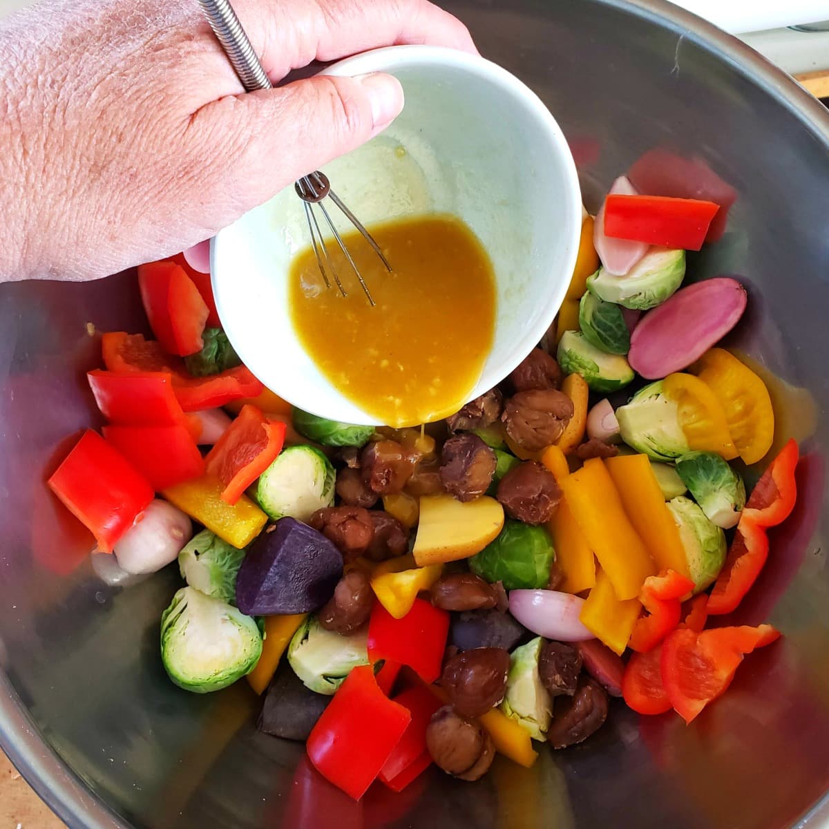 Pour dressing onto the vegetables