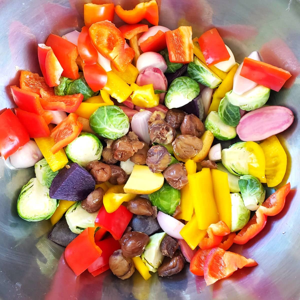 Put vegetables in a big mixing bowl