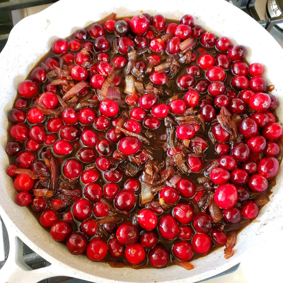 Simmer cranberries and onions