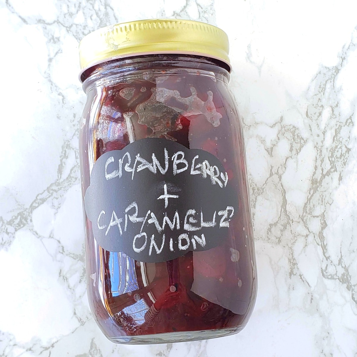Store the cranberry sauce in a jar in the refrigerator
