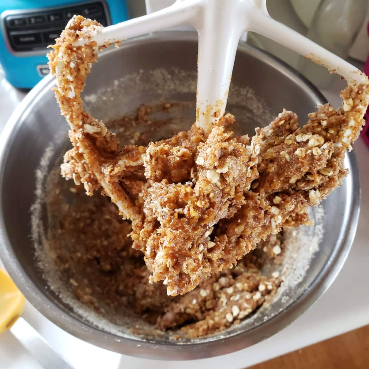 Mix the batter for Roasted Banana Almond Butter Breakfast Cookies