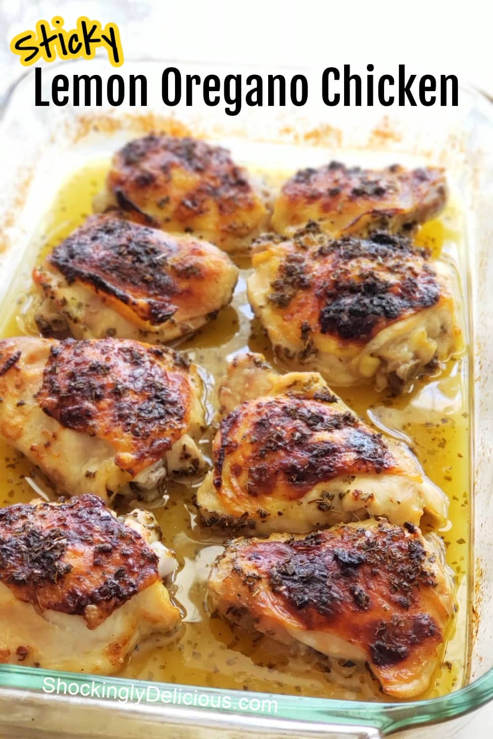 Recipe title superimposed over 8 pieces of browned chicken in a yellow sauce, in a glass baking dish