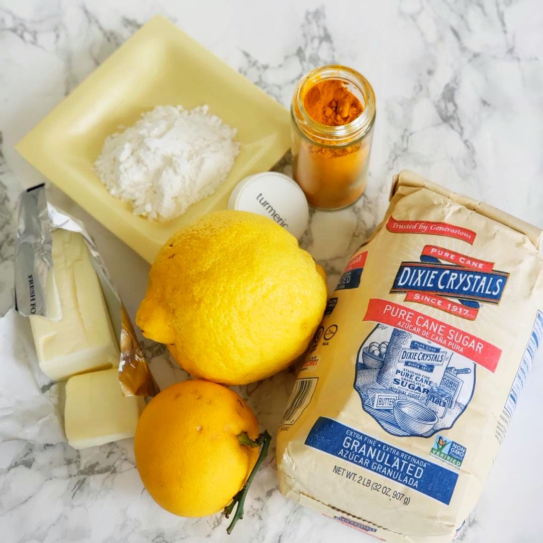 Ingredients for Lemon Filling Recipe on a white marble counter on ShockinglyDelicious.com