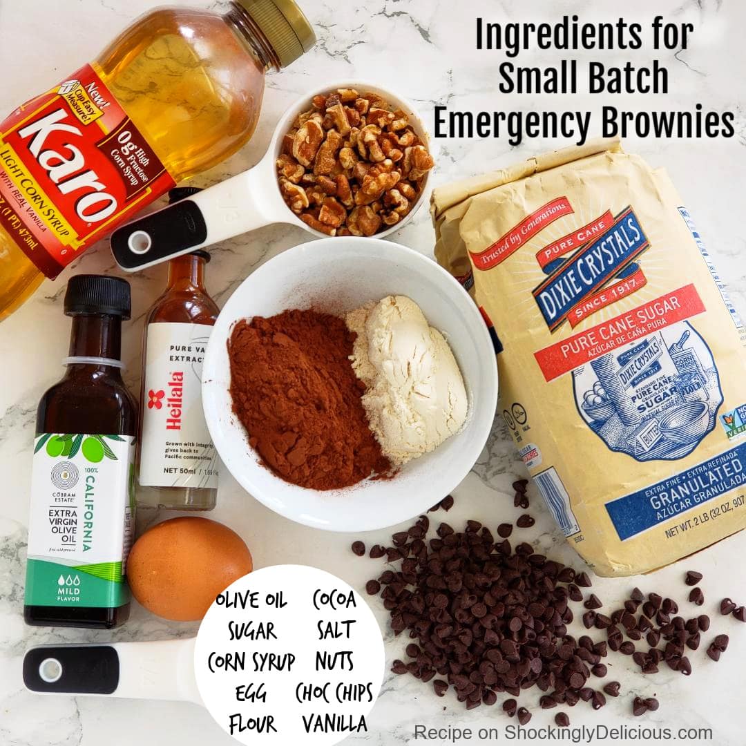 Ingredients for Small Batch Emergency Brownies laid out on a white marble counter