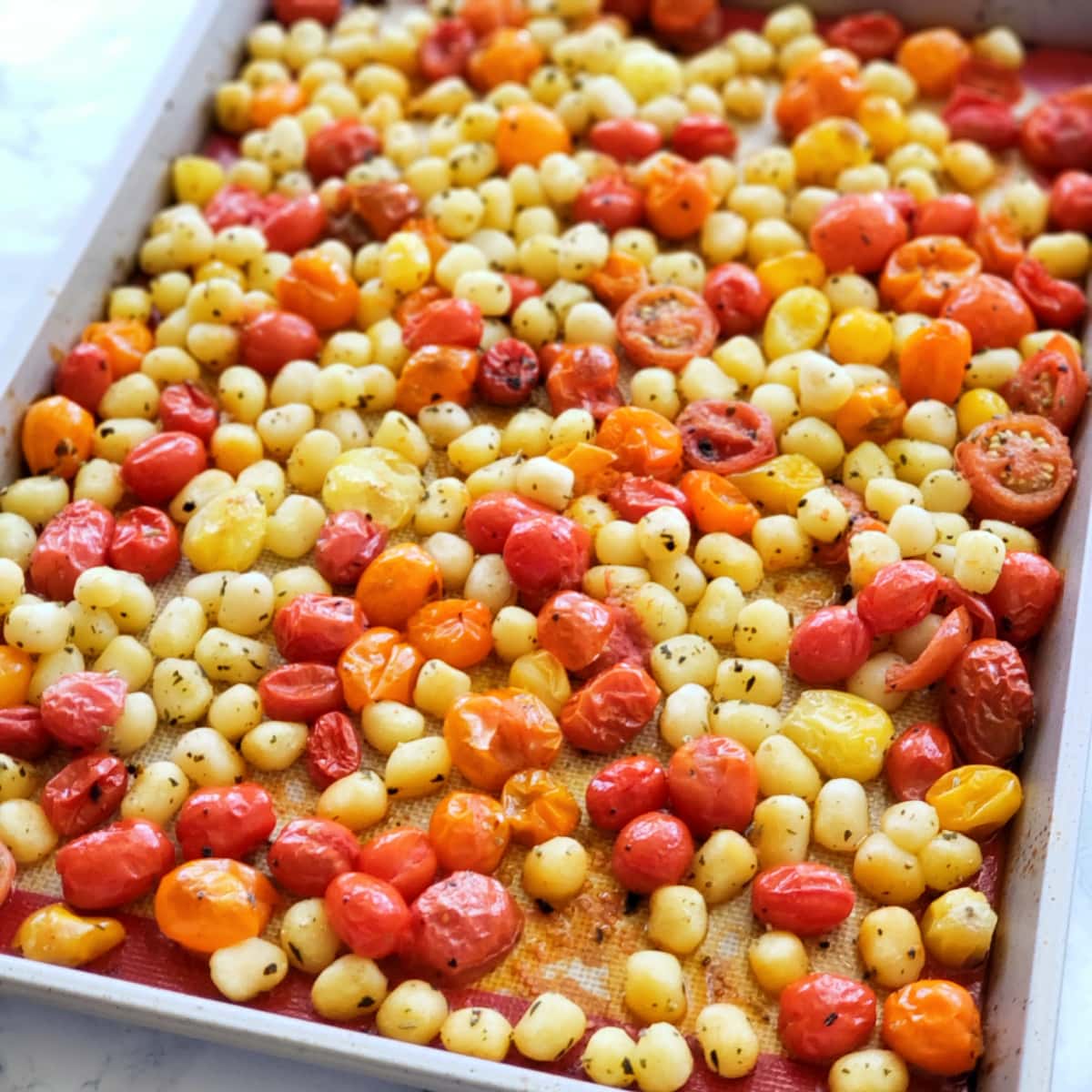 Tomatoes and gnocchi roasted straight from the oven