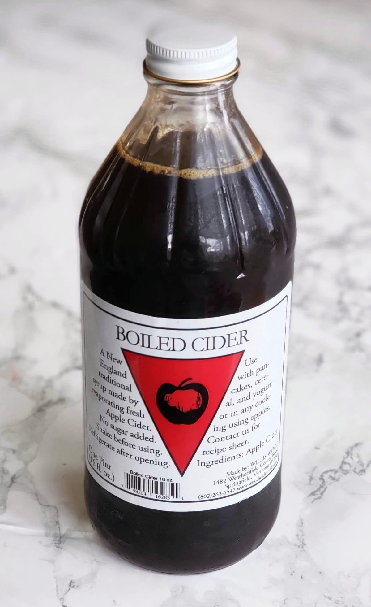 Boiled cider on a white marble counter top