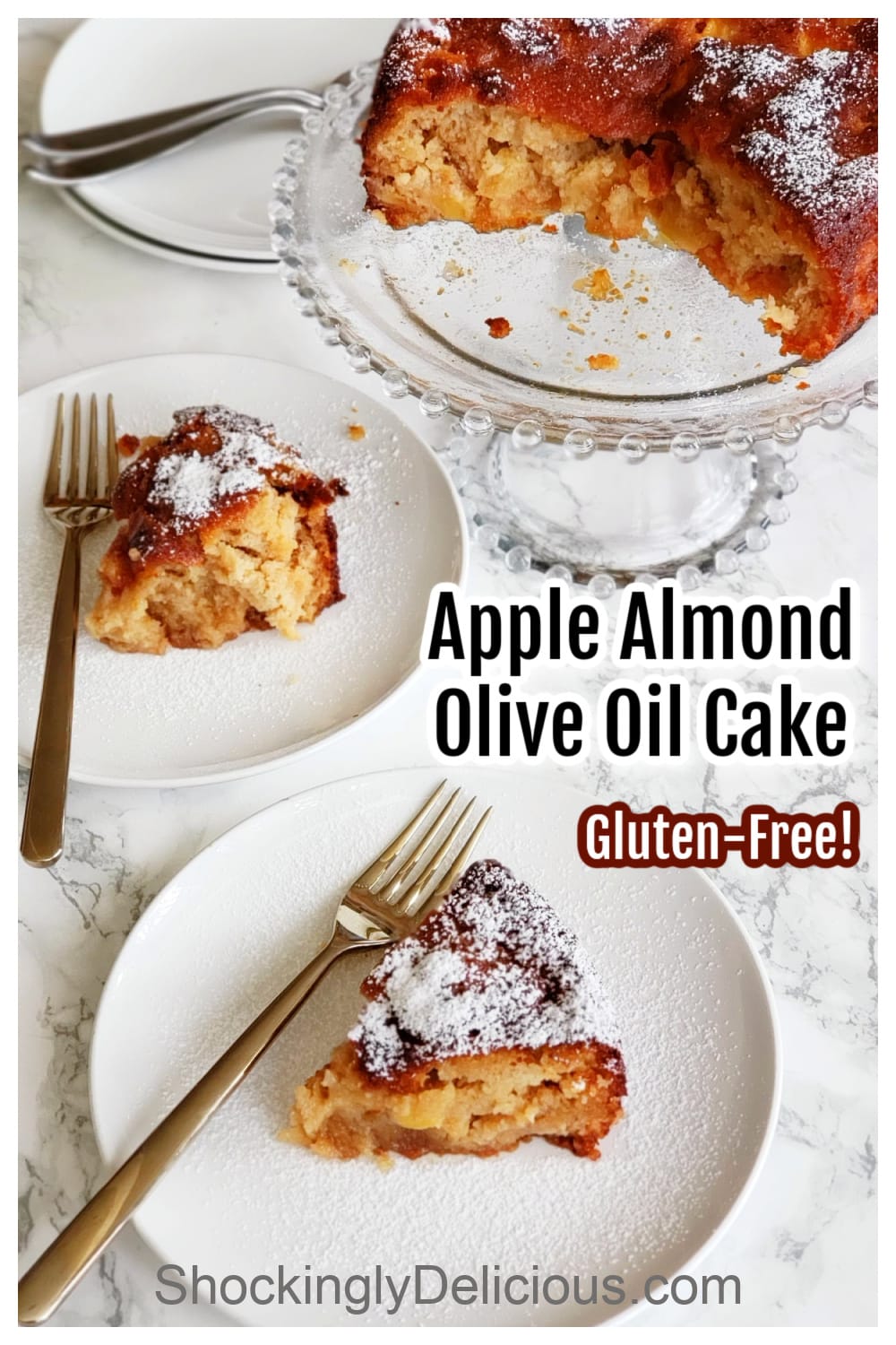 2 slices of Apple Almond Olive Oil Cake on white plates with the rest of the cake on a glass cakestand behind, and recipe title superimposed on top