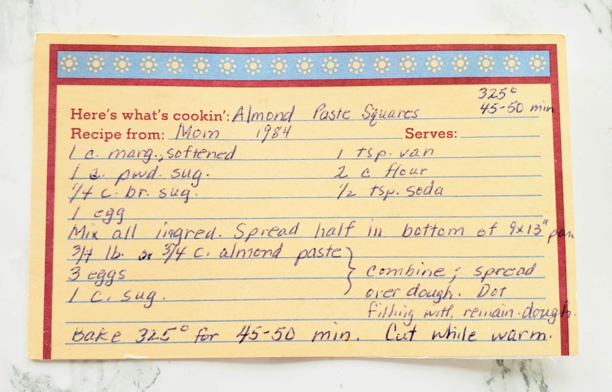 Recipe for Almond Paste Squares hand written on a yellowing old recipe card