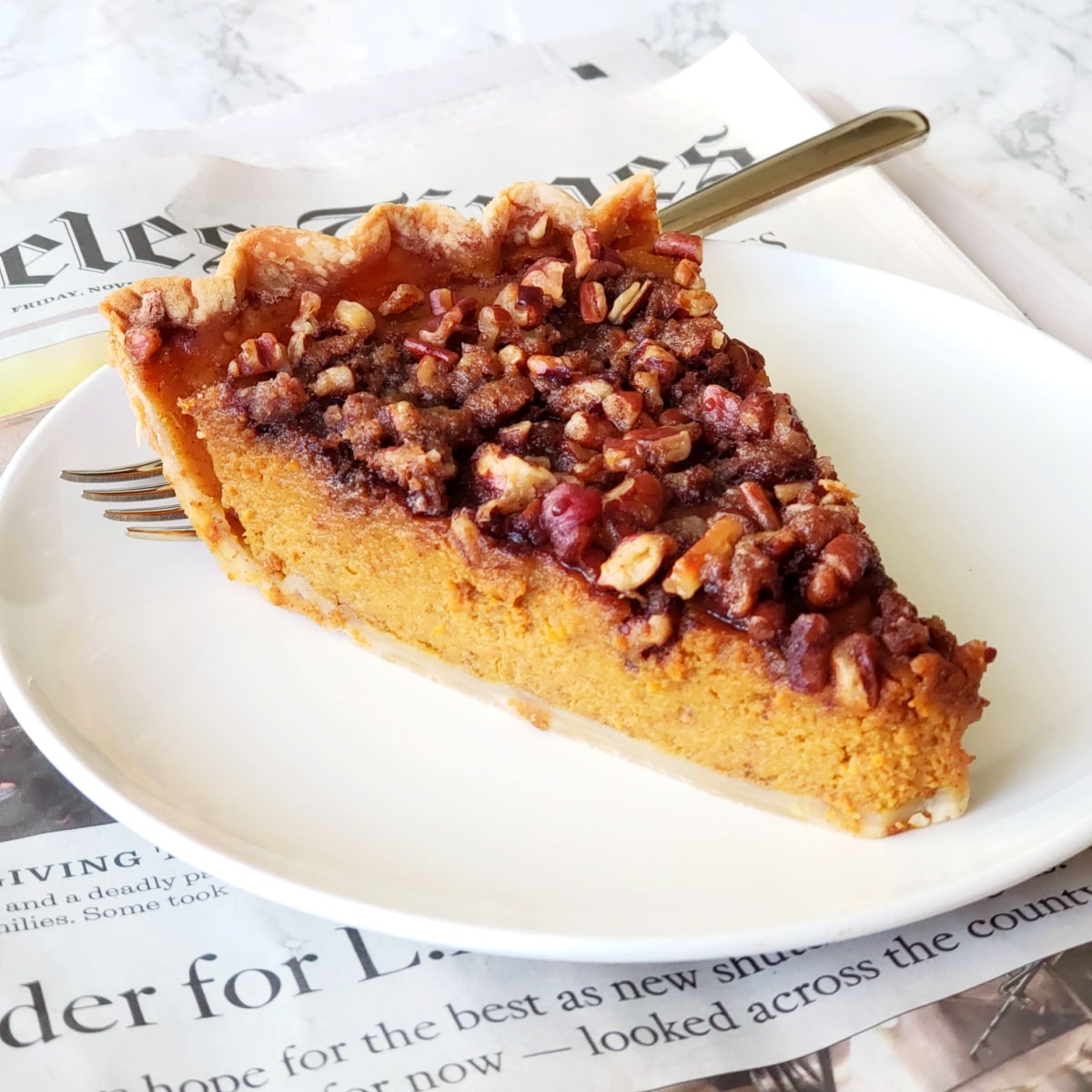 Pumpkin Pie with Maple Glazed Pecans on top on ShockinglyDelicious.com